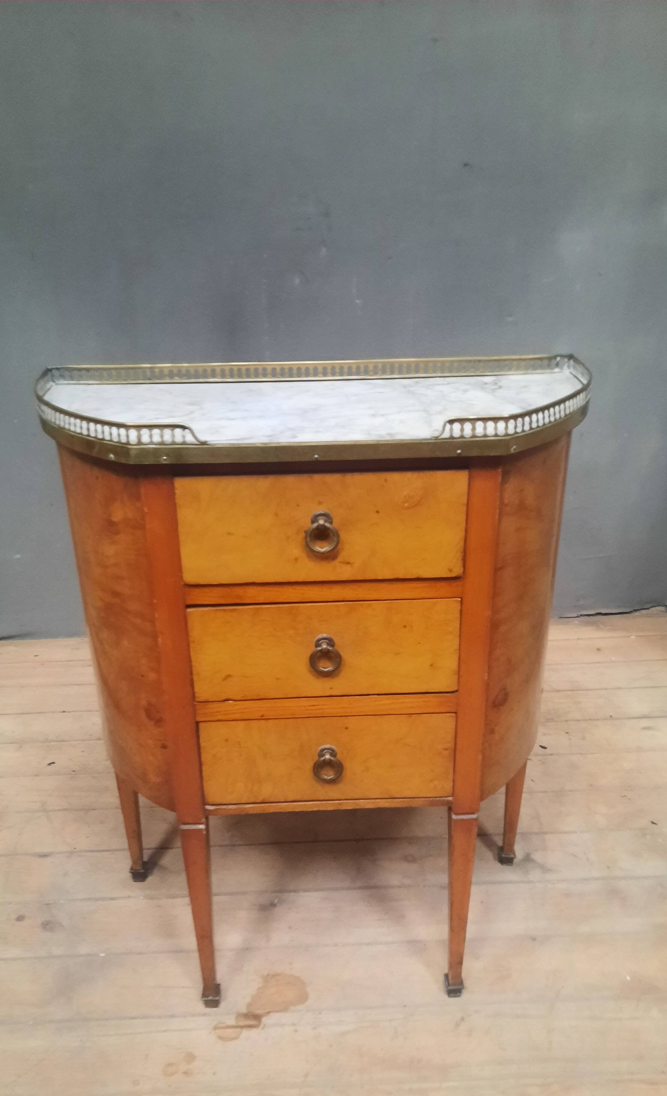 Small Louis XVI style chest of drawers with rounded sides
