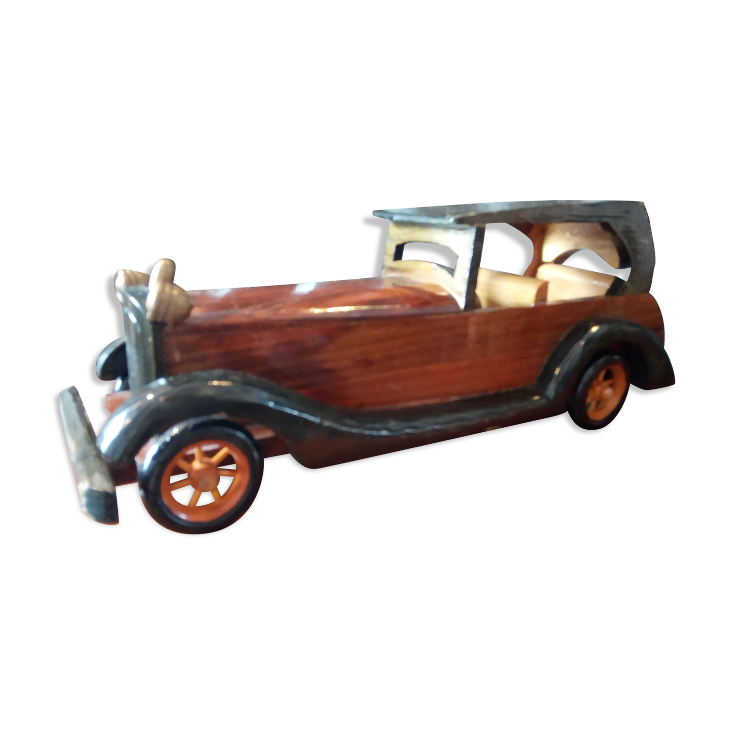Toy car made of varnished wood