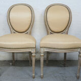 Paire de chaises de style Louis XVI