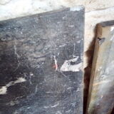 White veined black marble fireplace