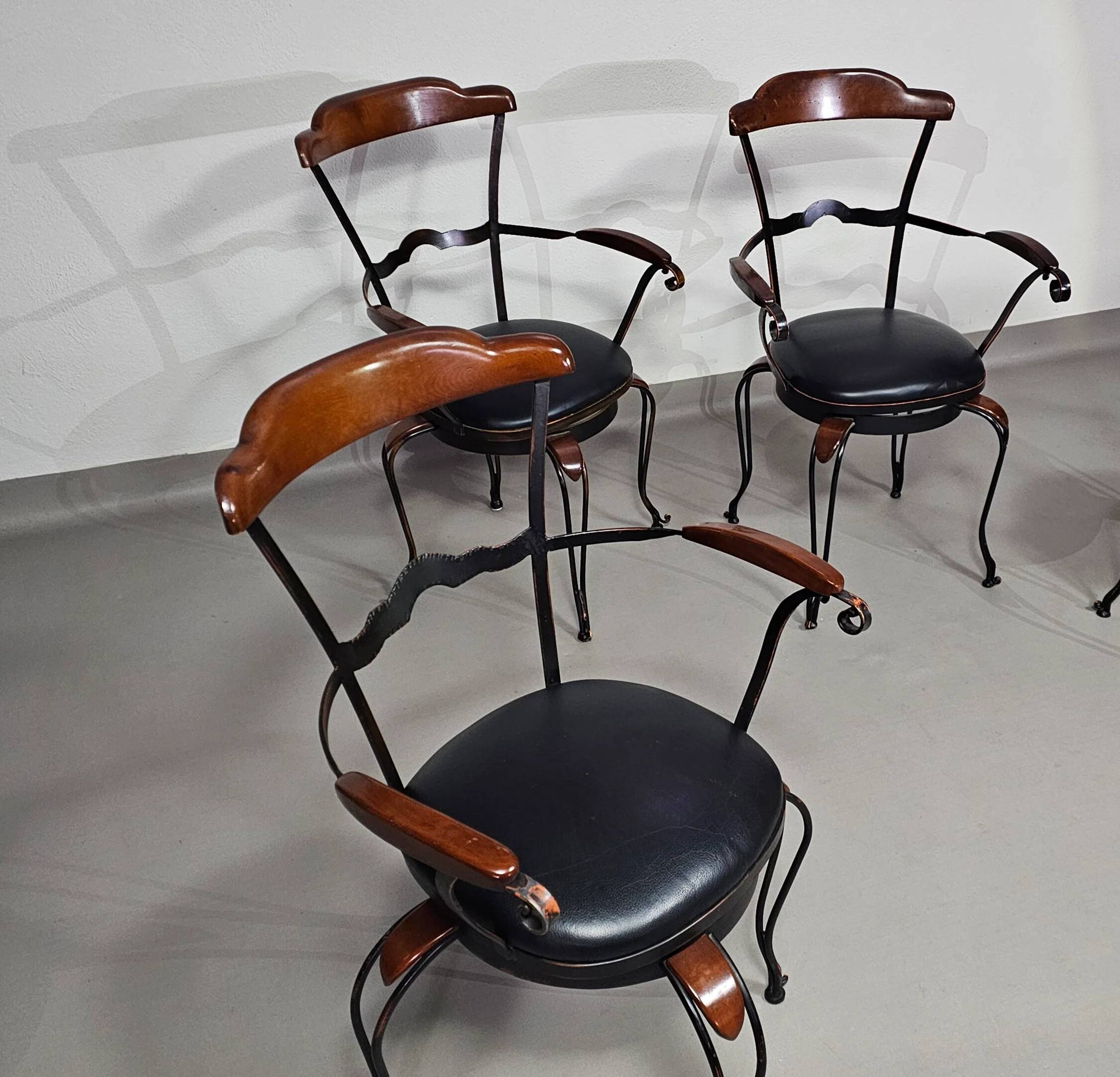 Italian postmodern turnable wrought iron dining chairs with leather seats