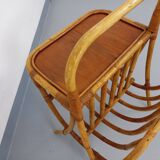 Side table with vintage rattan and wood magazine rack from the 60s