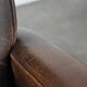 Set of two vintage sheepskin leather design armchairs in a cognac colour