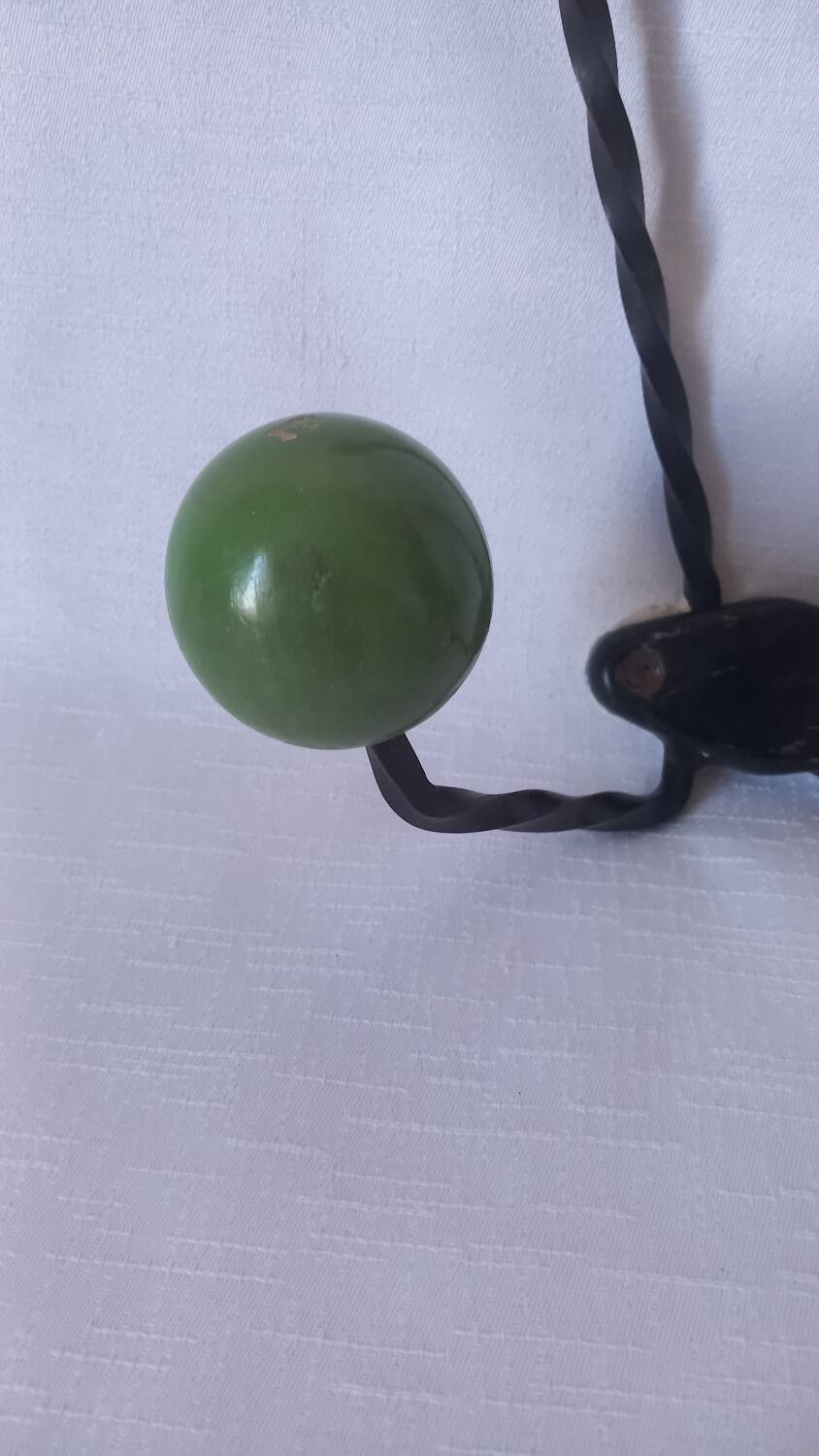 Vintage metal and wooden ball coat rack