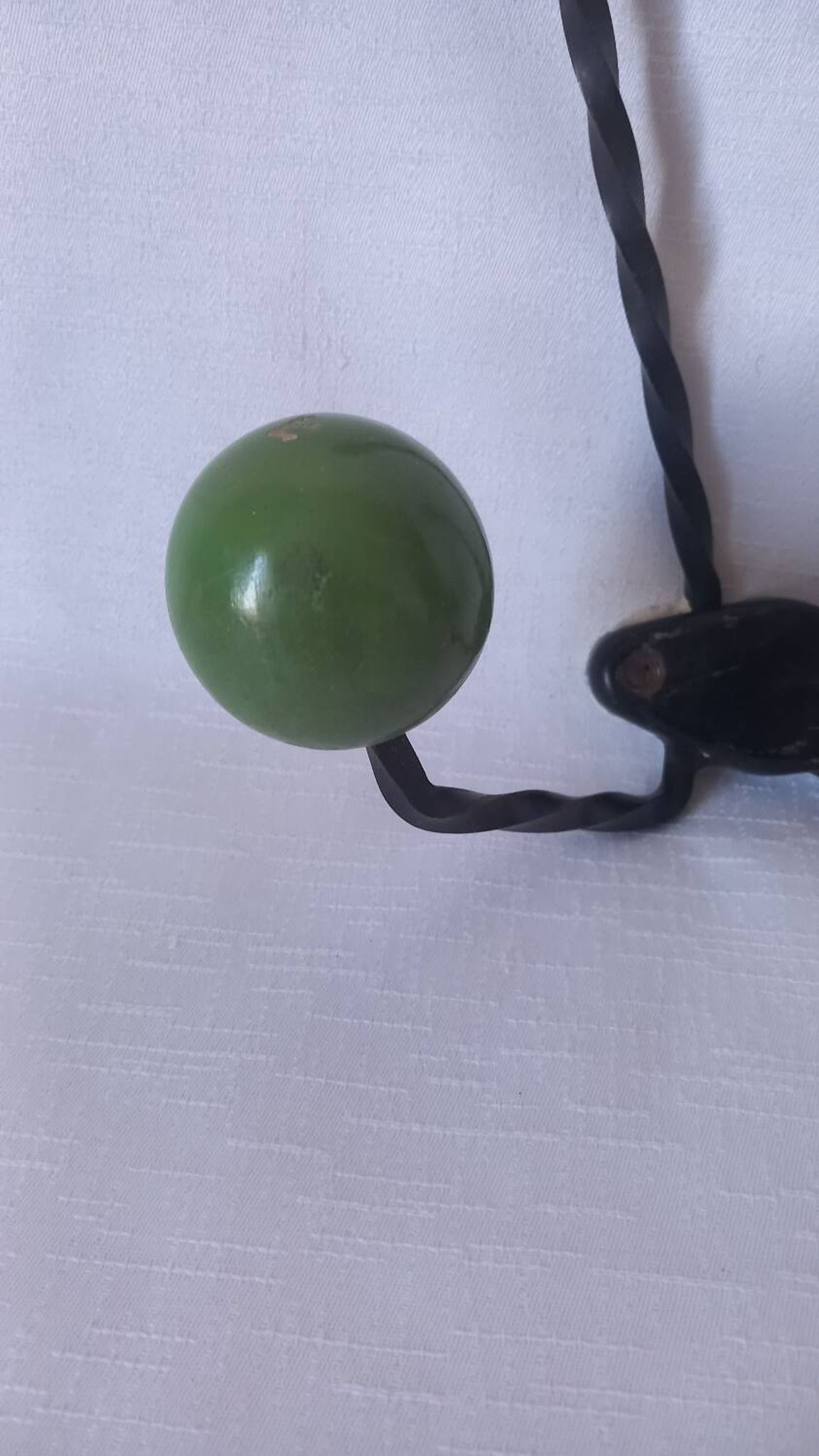 Vintage metal and wooden ball coat rack