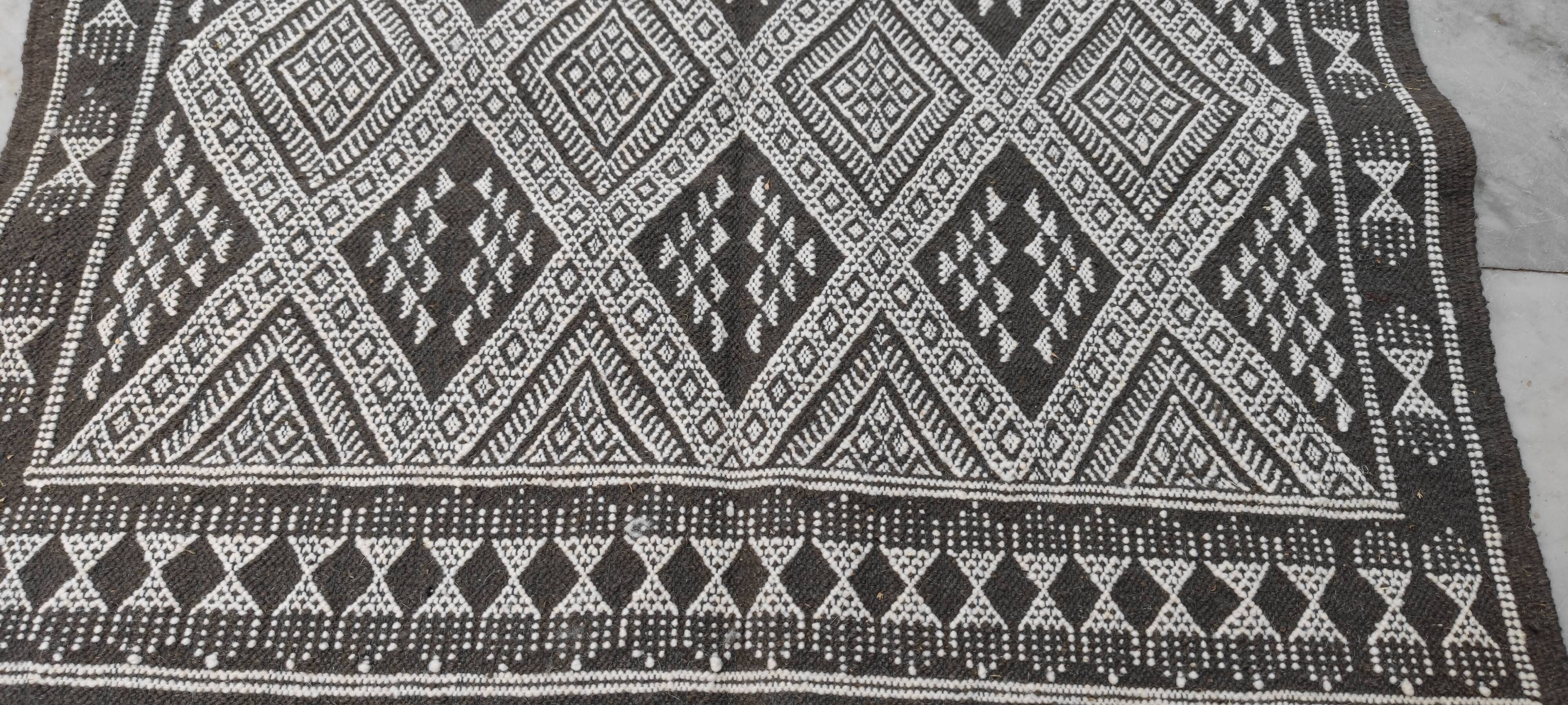 Handmade grey and white margoum carpet in natural wool