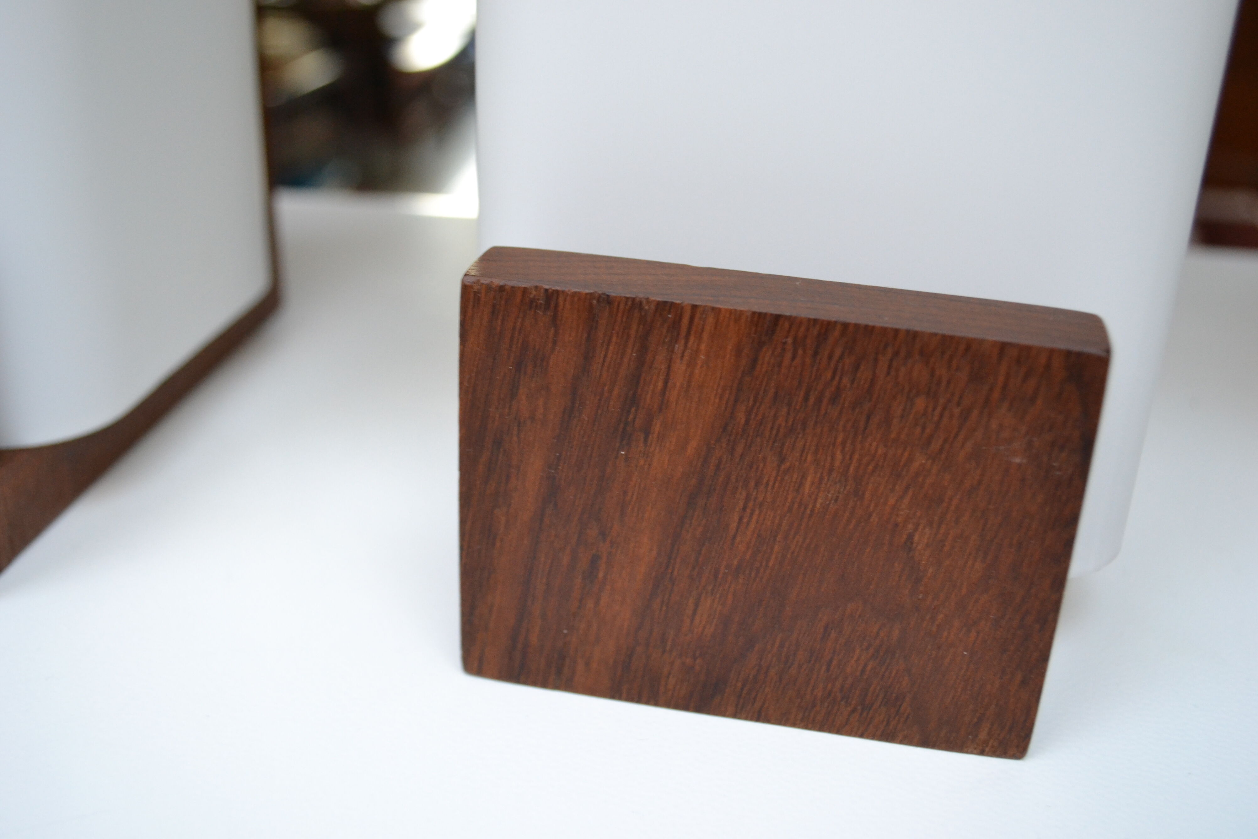 Pair of Louis Kalff opaline and teak wall lamps