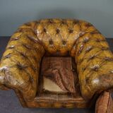 Patinated Chesterfield armchair
