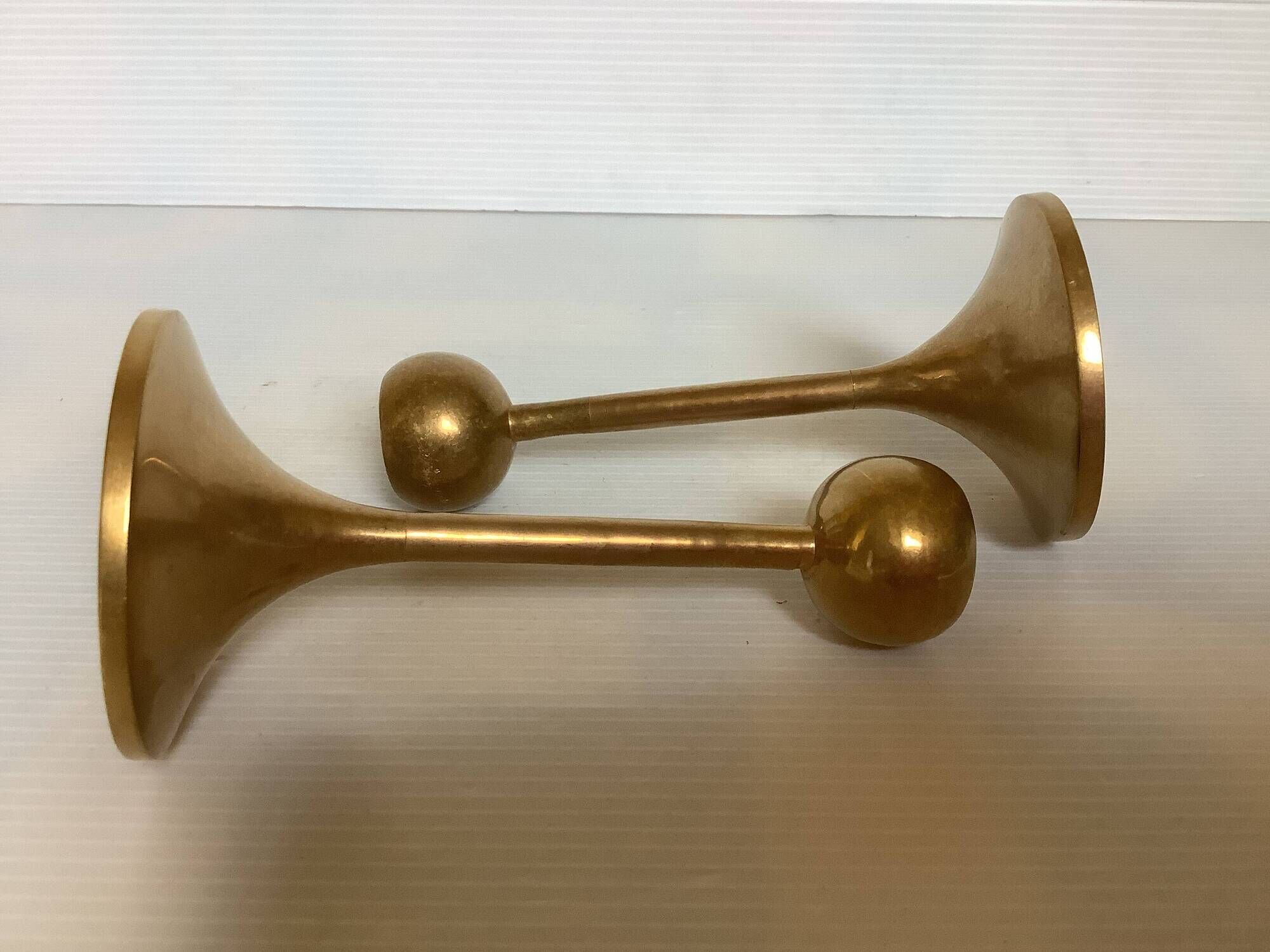 Pair of Scandinavian brass tulip foot candlesticks