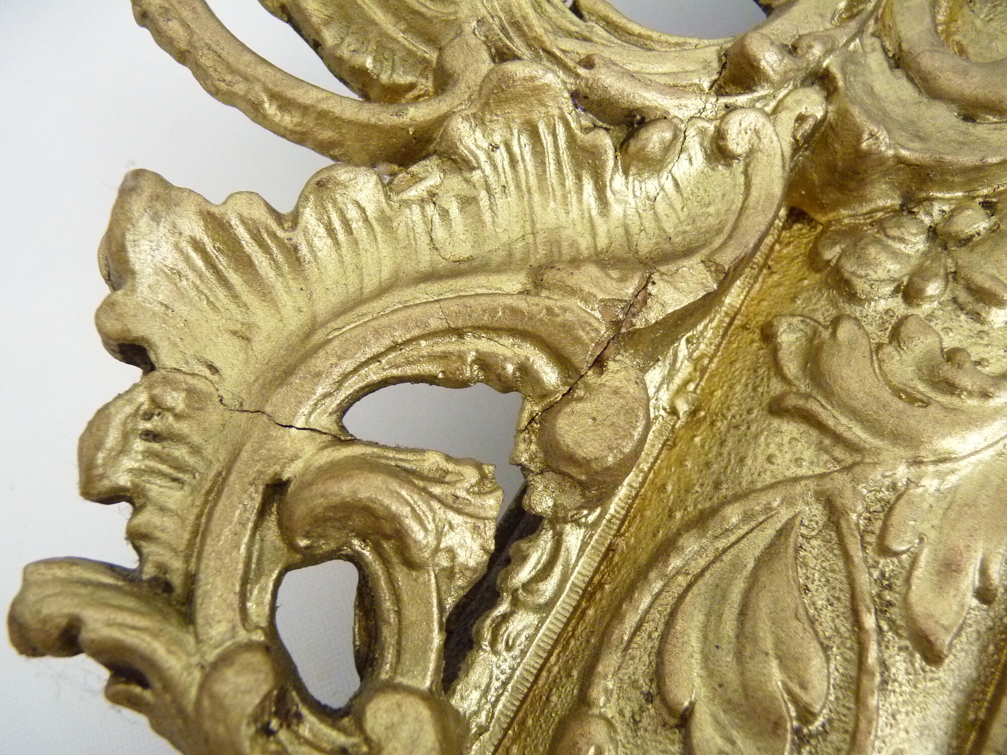 Old wall mirror in wood and gilded stucco, Louis XVI style. XIXth