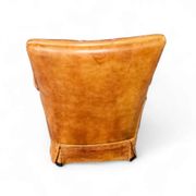 Sheep leather club chair 1970s with magazine holder