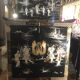 Asian lacquer cabinet with mother-of-pearl relief pattern