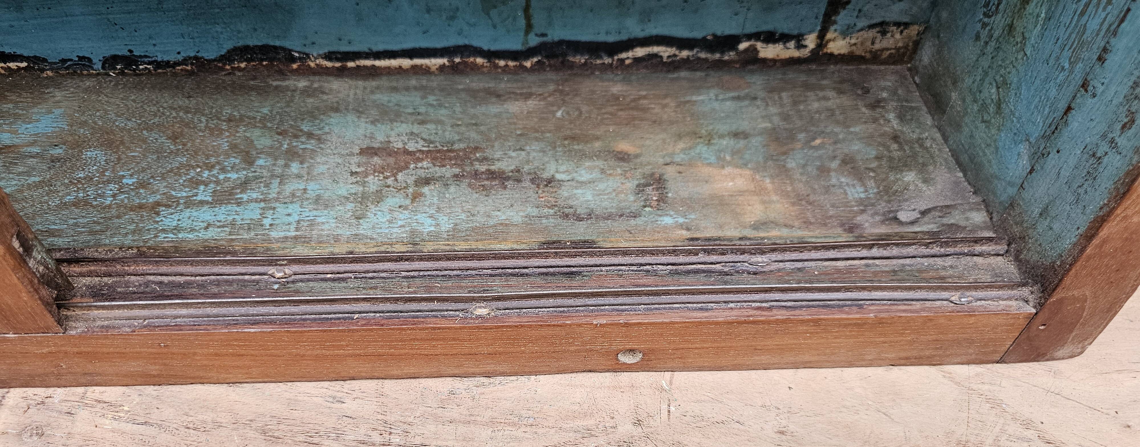 Old Art Deco display case in Burmese teak