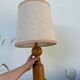 Old turned wooden lamp