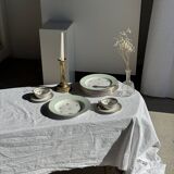 Set of 9 vintage turquoise deep plates with gold trim and pink flowers.