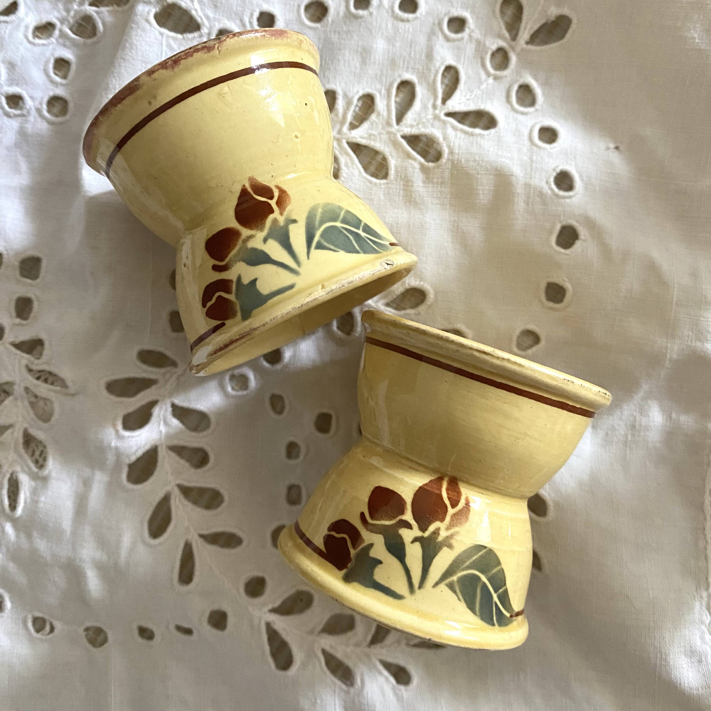 Antique diabolo egg cups