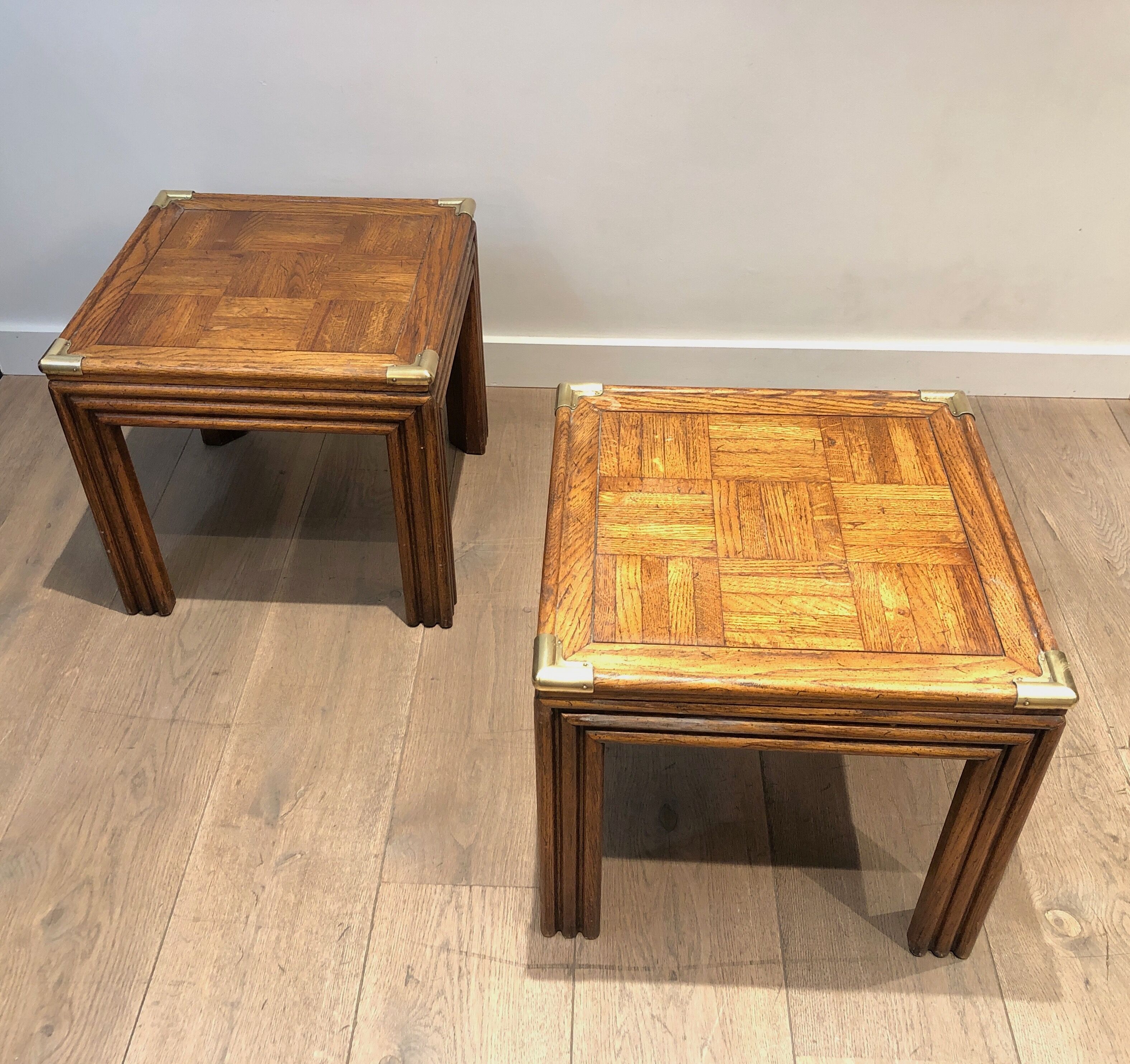 Pair of wooden and brass sofa ends