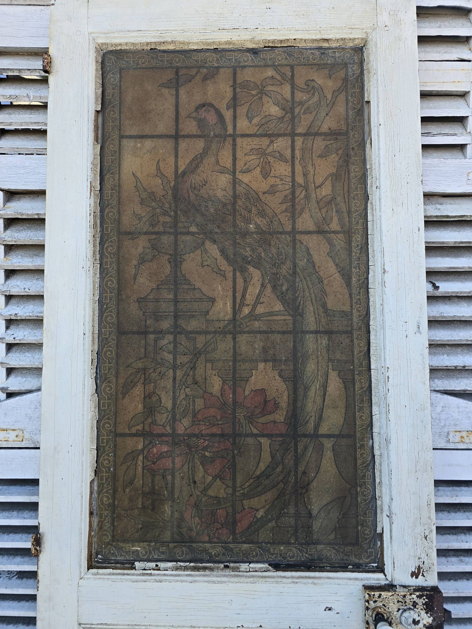 old door with decorated window