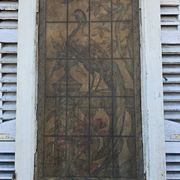 old door with decorated window