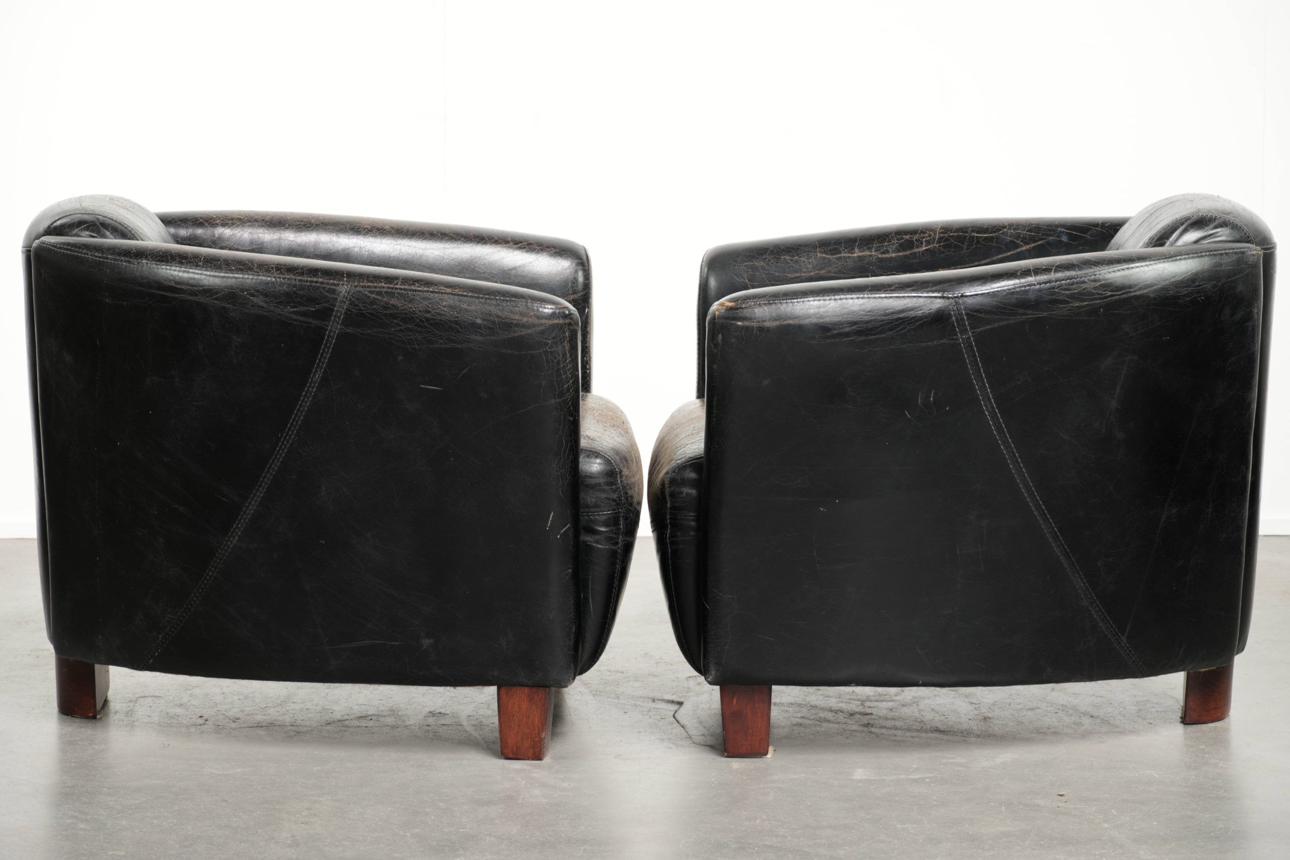 Set of two black vintage cowhide aviator design armchairs