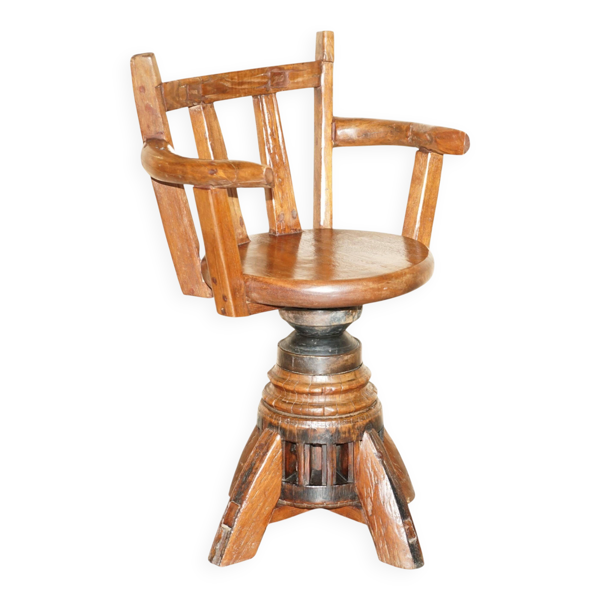Antique captain's swivel chair on a draft horse wheel from around 1760.