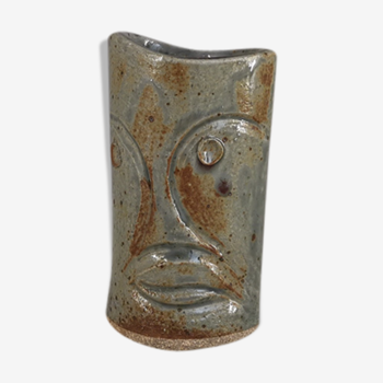 Signed vase in enamelled sandstone with stylized face
