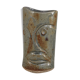 Signed vase in enamelled sandstone with stylized face