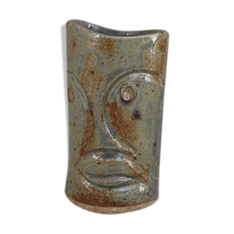 Signed vase in enamelled sandstone with stylized face