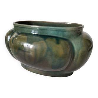 Art Deco lobed cache-pot in glazed turquoise earthenware.