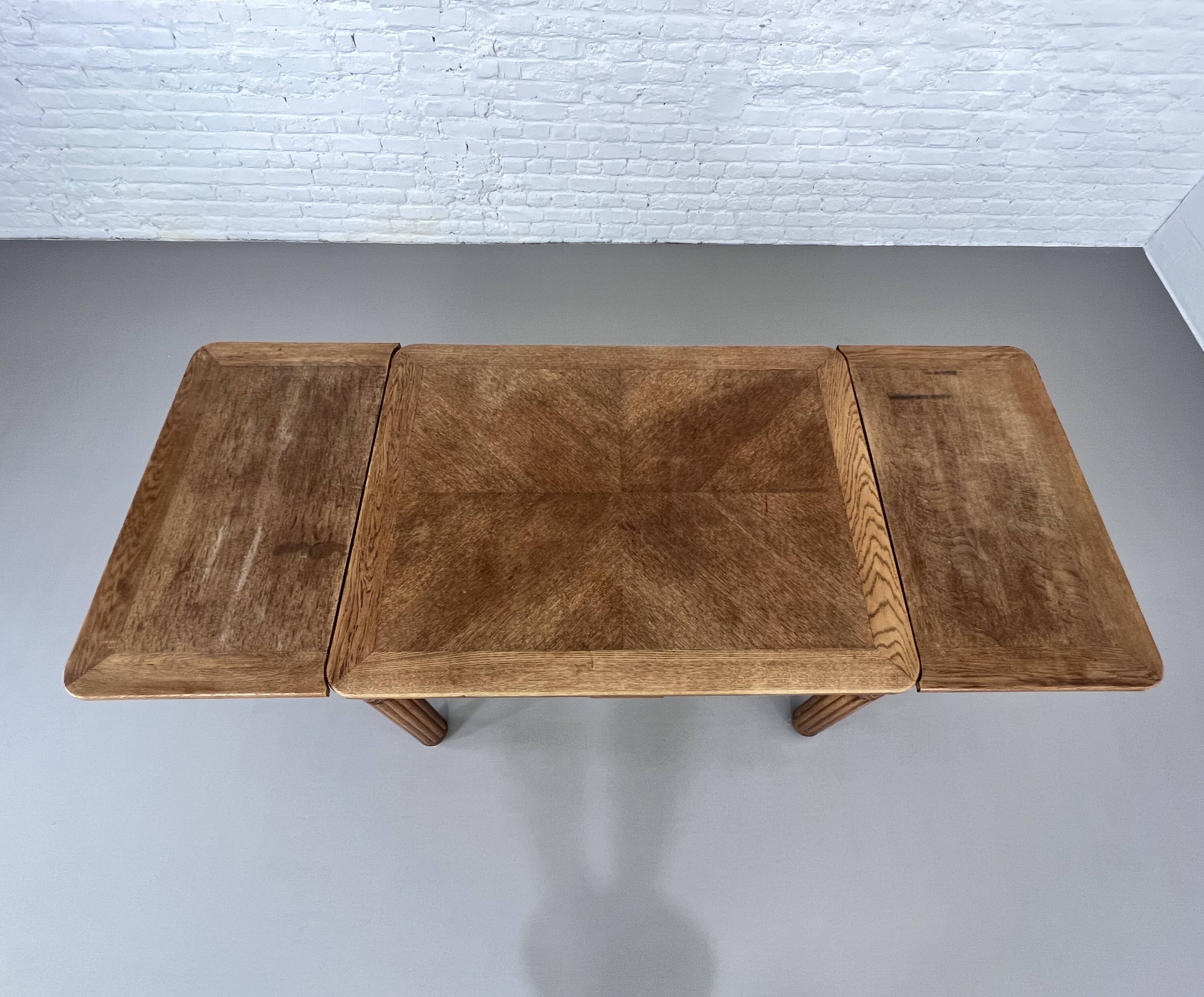 Rectangular dining table in oak and extendable early twentieth century