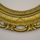 Oval frame in golden resin