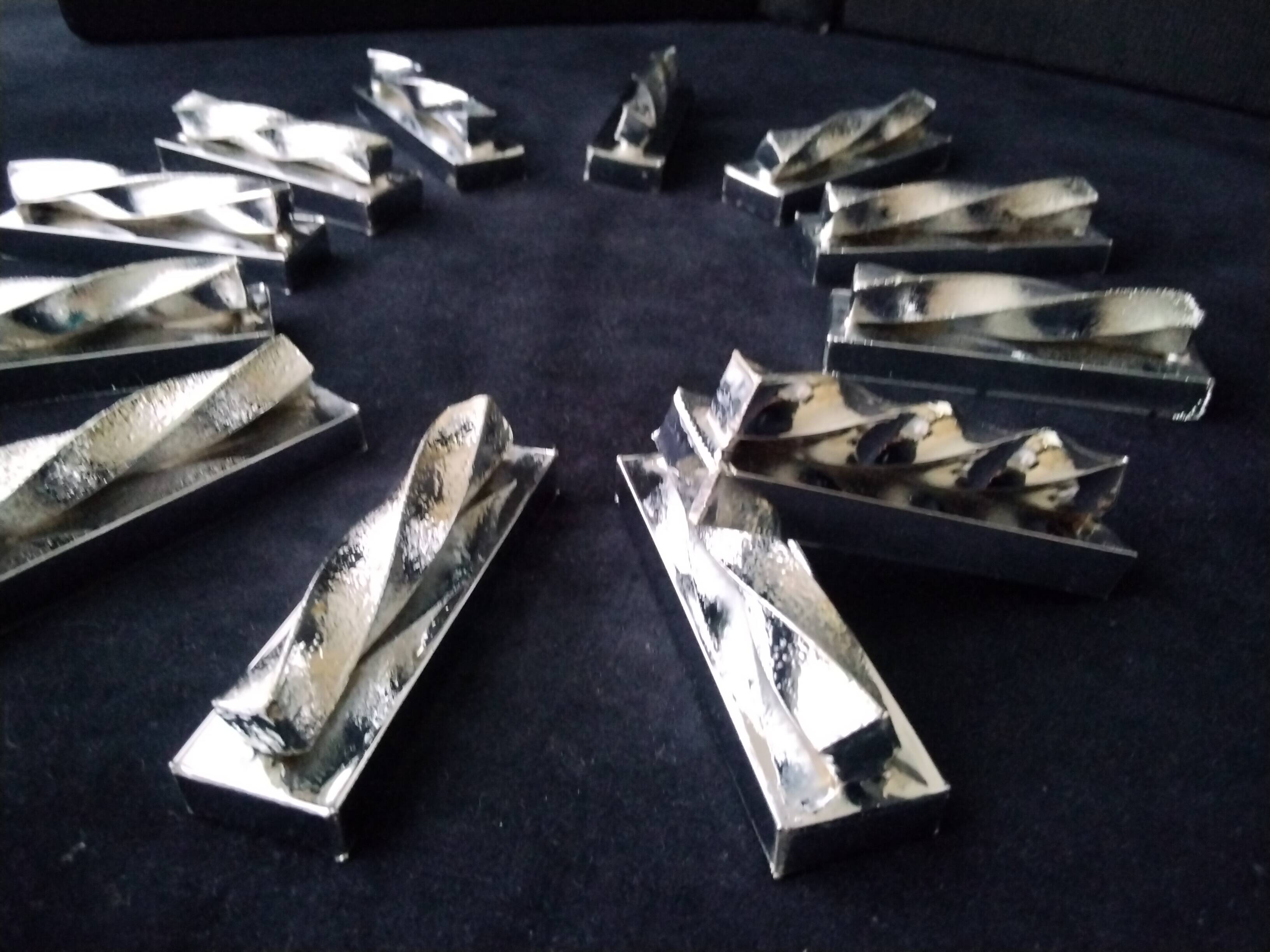 12 silver metal knife holders