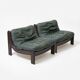 Pair of low sling chairs in hardwood and leather, Germany, 1970s