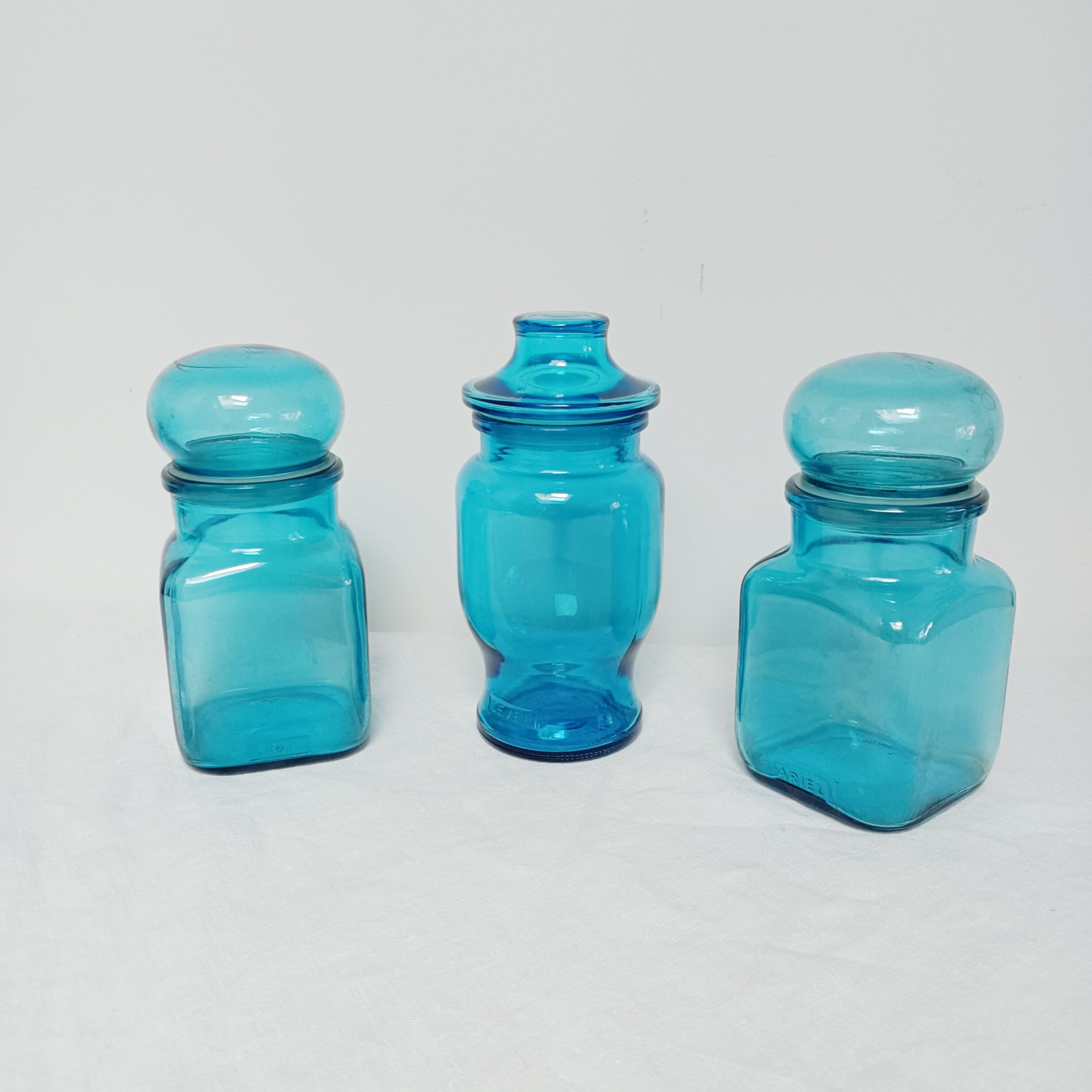 Set of 3 blue glass apothecary jars