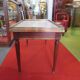 Table basse style louis XVI en acajou et laiton