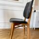 Pair of vintage wood and leather chairs