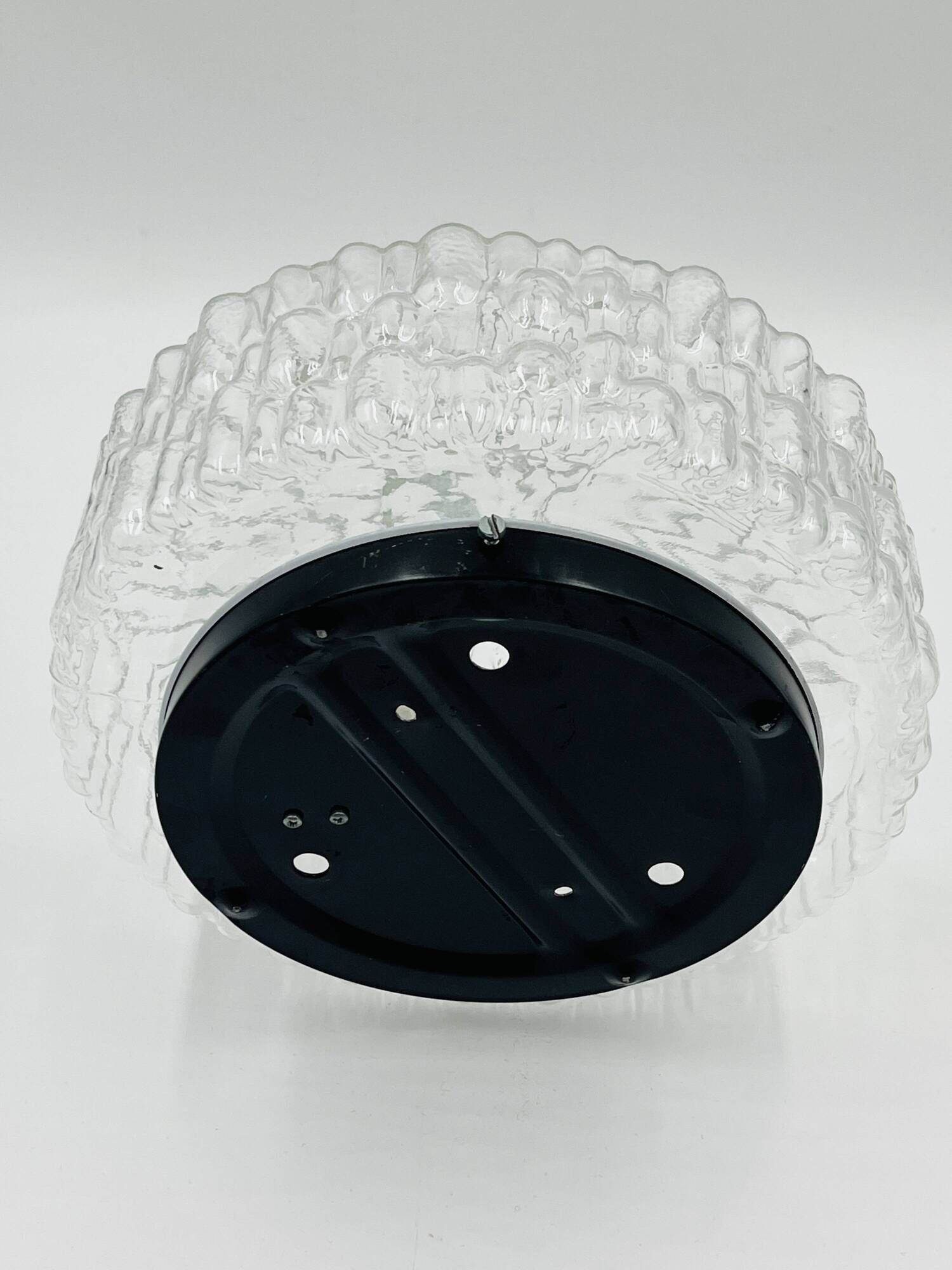 Massive modernist ceiling light in moulded glass