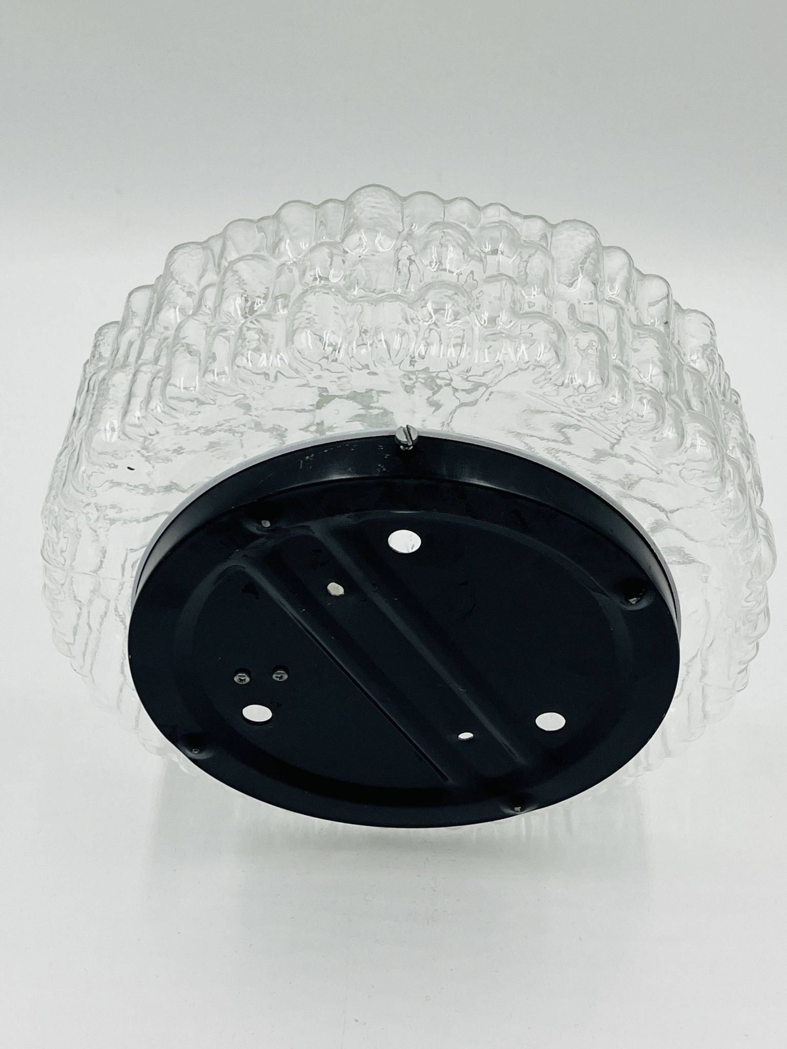Massive modernist ceiling light in moulded glass