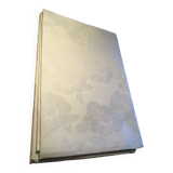 White damask tablecloth with flower pattern