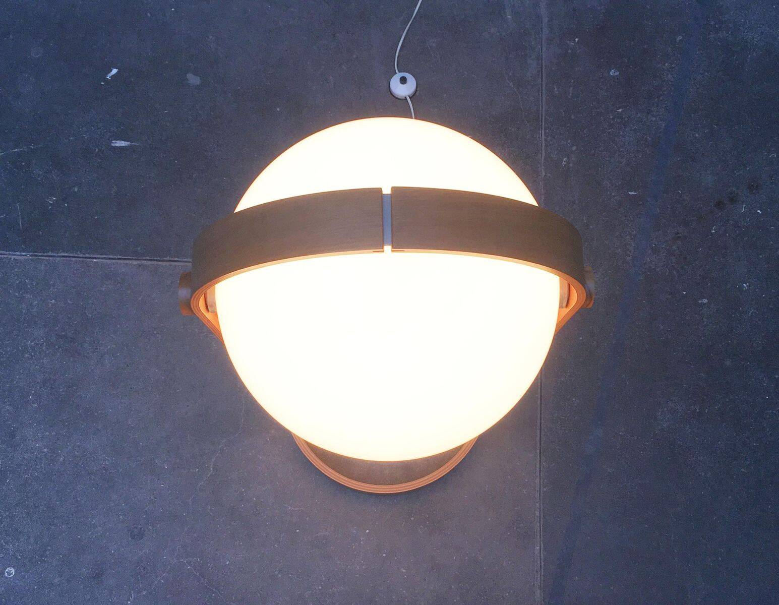 Swiss space-style floor lamp made of plastic and plywood from the 1960s.