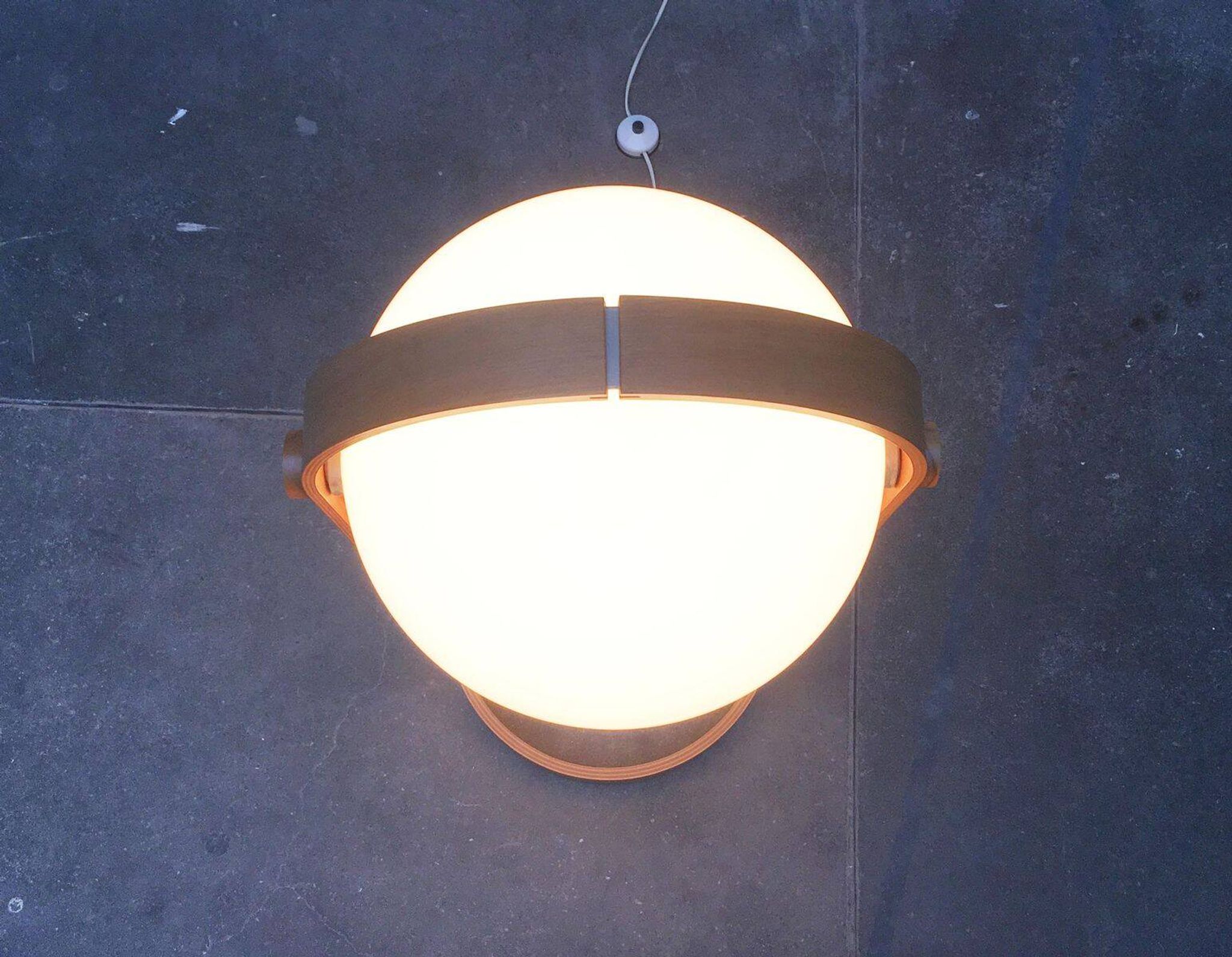 Swiss space-style floor lamp made of plastic and plywood from the 1960s.