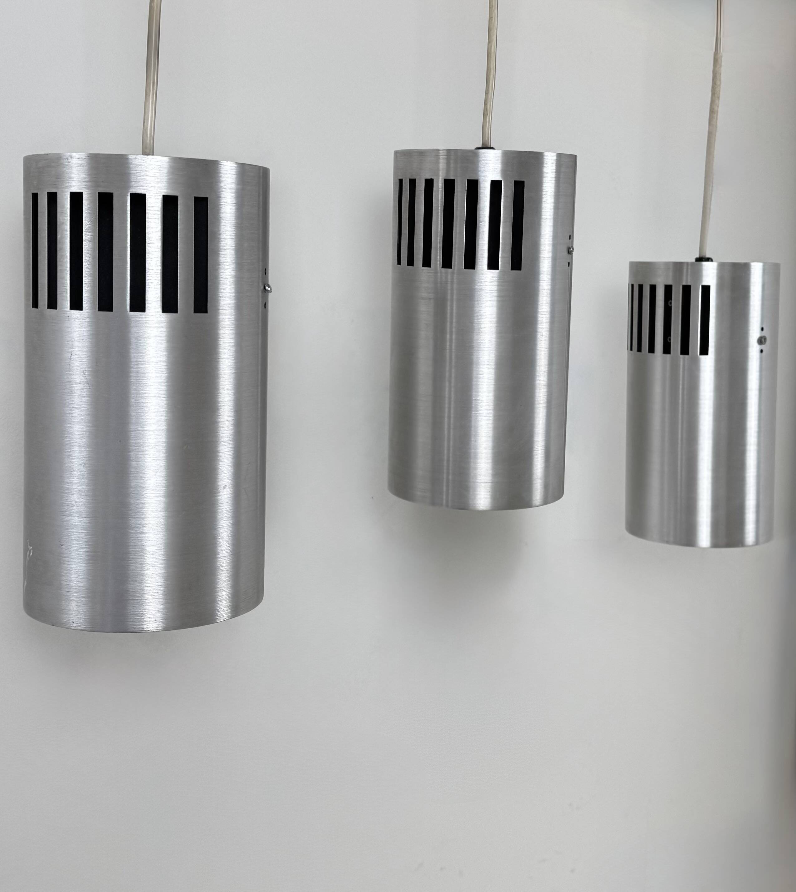 Set of 3 vintage brushed metal pendants, France, 1970.