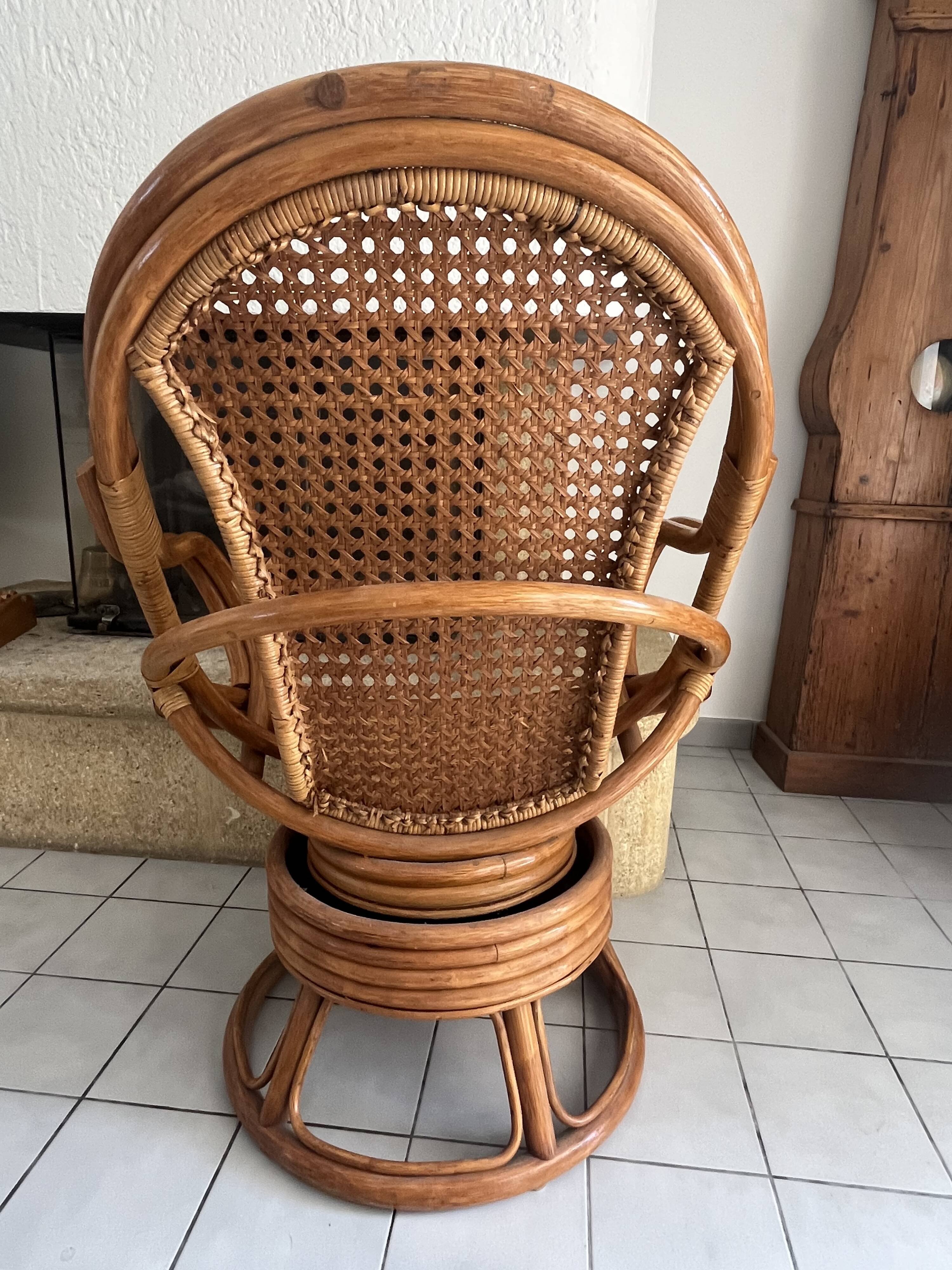 Vintage rattan and cane swivel armchair (1970s/80s) -