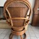 Vintage rattan and cane swivel armchair (1970s/80s) -