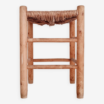 Old stool in wood and straw brutalist look