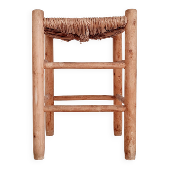 Old stool in wood and straw brutalist look