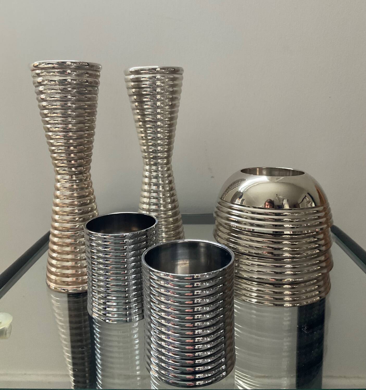 Series of 8 vintage candlesticks in silver metal