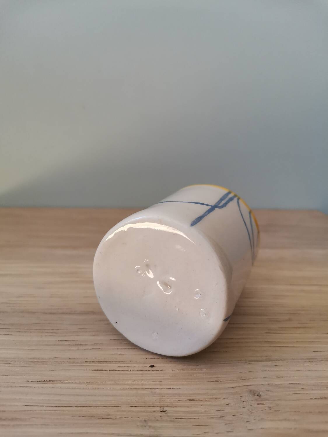 Handmade ceramic coffee cup blue yellow line