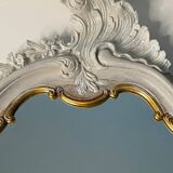 Magnificent patinated and gilded baroque style mirror