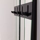 Pair of wall hangers with vintage 70s mirrors italian design
